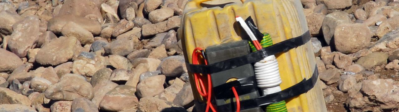 an Improvised Explosive Device while searching in the Mirabad Valley Region, Afghanistan 