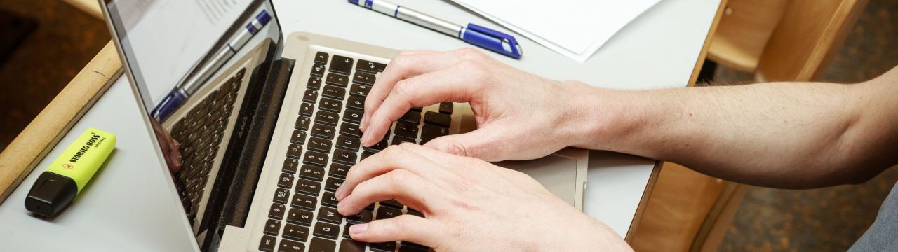 Student taking notes