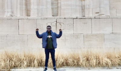 Jean-Paul Nizigiyimana in front of the Mur des Réformateurs in Geneva