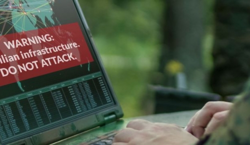 Computer screen with warning: civilian infrastucture: do not attack