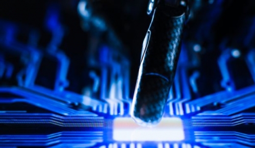 Futuristic Robot Arm Interacting with Screen